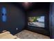 Home theater featuring a large screen for immersive viewing and cozy, reclining chairs for maximum comfort at 2365 Novus St, Sarasota, FL 34237