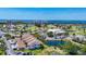 Aerial view of residential area near the water with golf courses and resort buildings, offering a luxurious lifestyle at 2609 Waterford Way # B, Palmetto, FL 34221