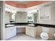 Bright bathroom features dual sinks and toilet at 2609 Waterford Way # B, Palmetto, FL 34221