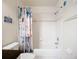 A bright bathroom with vanity and a tub with shower at 2609 Waterford Way # B, Palmetto, FL 34221