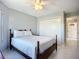 This bedroom has a large window for natural lighting and neutral decor at 2609 Waterford Way # B, Palmetto, FL 34221