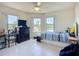 A bright bedroom with a window overlooking the neighborhood at 2609 Waterford Way # B, Palmetto, FL 34221
