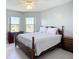 This bedroom has a large window for natural lighting and neutral decor at 2609 Waterford Way # B, Palmetto, FL 34221