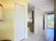 The entryway features light colored walls, tile floors, and a bright security door at 2609 Waterford Way # B, Palmetto, FL 34221