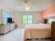 Spacious main bedroom featuring tile flooring and abundant natural light at 2609 Waterford Way # B, Palmetto, FL 34221