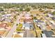 Features an aerial view of the home with surrounding neighborhood and tree coverage at 2705 20Th Avenue W Dr, Bradenton, FL 34205