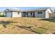 Attractive home with a front lawn and attached garage at 2705 20Th Avenue W Dr, Bradenton, FL 34205