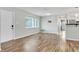 Bright living room boasts wood-look flooring and ample natural light from large windows at 2705 20Th Avenue W Dr, Bradenton, FL 34205