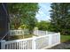 Charming fenced-in backyard with lush greenery and mature trees, offering privacy at 3201 Wilderness W Blvd, Parrish, FL 34219