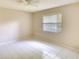 Bright bedroom with tile flooring, ceiling fan, and a window offering natural light at 3201 Wilderness W Blvd, Parrish, FL 34219