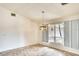 Inviting dining room with natural light and simple chandelier at 3201 Wilderness W Blvd, Parrish, FL 34219