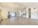 Spacious living room that opens up to the kitchen and lanai at 3201 Wilderness W Blvd, Parrish, FL 34219