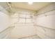 Walk-in closet featuring wire shelving on all walls for organized storage at 3201 Wilderness W Blvd, Parrish, FL 34219