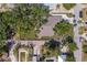 Aerial view of the property showcasing the home, lush landscaping and surrounding neighborhood at 3209 2Nd W Ave, Bradenton, FL 34205