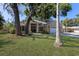 Charming home with stone accents, well-manicured lawn, and lush landscaping at 3209 2Nd W Ave, Bradenton, FL 34205