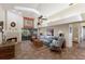 Spacious living room with fireplace, high ceilings, large windows, tile floors, and comfortable seating at 3209 2Nd W Ave, Bradenton, FL 34205