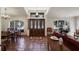 Inviting living room with tile floors, large windows, and a view of the entrance at 3209 2Nd W Ave, Bradenton, FL 34205