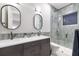 Modern bathroom featuring dual sinks, a glass-enclosed shower, and sleek finishes at 3302 Sabal Cove Ln, Longboat Key, FL 34228