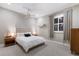 Comfortable bedroom with neutral decor, a ceiling fan, and classic furnishings at 3302 Sabal Cove Ln, Longboat Key, FL 34228