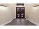 Home foyer featuring a tiled floor and a front entry door with sidelights and overhead transom at 3302 Sabal Cove Ln, Longboat Key, FL 34228
