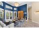 Spacious living room with high ceilings and large windows at 3302 Sabal Cove Ln, Longboat Key, FL 34228