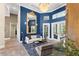 Bright living room with stylish seating and a decorative mirror at 3302 Sabal Cove Ln, Longboat Key, FL 34228