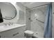 Modern bathroom featuring new fixtures, walk-in shower, vanity, and handicap assist features at 3500 El Conquistador Pkwy # 301, Bradenton, FL 34210