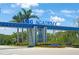 Entrance to IMG Academy at 5650 Bollettieri Blvd features blue signage at 3500 El Conquistador Pkwy # 301, Bradenton, FL 34210