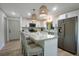 Modern kitchen boasts granite countertops, stainless steel appliances, and ample storage at 3500 El Conquistador Pkwy # 301, Bradenton, FL 34210