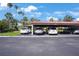 Covered parking area with multiple spaces available to residents at 3500 El Conquistador Pkwy # 301, Bradenton, FL 34210