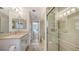 Bathroom view includes tile flooring, a walk-in shower, and granite countertops at 3608 Avenida Madera, Bradenton, FL 34210