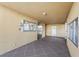 Hallway view showcasing the elevator, mailboxes, bulletin board, and access to apartments at 3750 Pinebrook Cir # 104, Bradenton, FL 34209