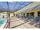 An inviting pool with patio chairs surrounding a well-maintained pool area at 3750 Pinebrook Cir # 104, Bradenton, FL 34209