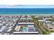 Aerial shot featuring condominium community, private pool, and convenient covered parking at 3806 Gulf Of Mexico Dr # C311, Longboat Key, FL 34228