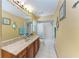 Bathroom with a single sink and shower-tub combination at 410 136Th E Ct, Bradenton, FL 34212