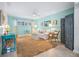 Cozy living room with light blue walls, bright decor, and comfortable seating arrangements at 410 Garfield Dr, Sarasota, FL 34236
