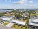 Aerial view of waterfront homes with docks, lush landscaping, and stunning waterway views at 4309 Pinfish Ln, Palmetto, FL 34221