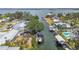 Waterfront homes with boat docks and canals, showcasing backyard pools and serene boat lifts at 4309 Pinfish Ln, Palmetto, FL 34221