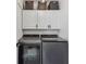 Modern laundry room featuring front loading washer and dryer at 4309 Pinfish Ln, Palmetto, FL 34221