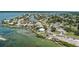 An expansive aerial view of a charming coastal neighborhood featuring waterfront access and community boat dock at 4403 5Th W Ave, Palmetto, FL 34221