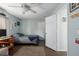 Bedroom showcasing a ceiling fan, wood flooring, and neutral paint at 4403 5Th W Ave, Palmetto, FL 34221