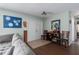Inviting entryway featuring wood floors, decorative furniture, and light, neutral walls at 4403 5Th W Ave, Palmetto, FL 34221