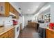 Bright kitchen featuring wood cabinets, modern appliances, and a neutral color palette at 4403 5Th W Ave, Palmetto, FL 34221