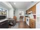 Kitchen area showcasing wood cabinets, modern appliances, and a garden window for natural light at 4403 5Th W Ave, Palmetto, FL 34221