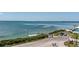 Scenic view of waterfront property with private dock, boat ramp, and parking at 4403 5Th W Ave, Palmetto, FL 34221