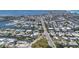 Discover an expansive waterfront community with diverse homes, canals, and easy access to the bay, perfect for coastal living at 501 Key Royale Dr, Holmes Beach, FL 34217