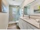 Modern bathroom with a glass shower, sleek vanity, and contemporary fixtures at 501 Key Royale Dr, Holmes Beach, FL 34217