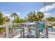 Outdoor deck with seating and expansive views of the waterway at 501 Key Royale Dr, Holmes Beach, FL 34217