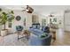 Comfortable living room with lots of seating and a view through to the dining area at 501 Key Royale Dr, Holmes Beach, FL 34217