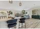 Open floor plan with barstool seating and a view to the living room at 501 Key Royale Dr, Holmes Beach, FL 34217